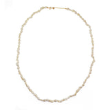 Collier doré et coquillages