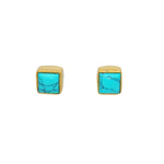 Boucles dorées et pierre carrée
