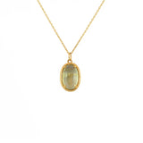 Collier doré scarabée pierre bombée