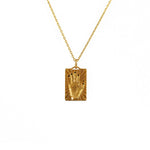 Collier doré mains et zircons