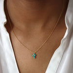 Collier doré pendentif croix turquoise et zircon blanc