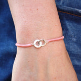 Bracelet cordon rose et anneaux argent 925