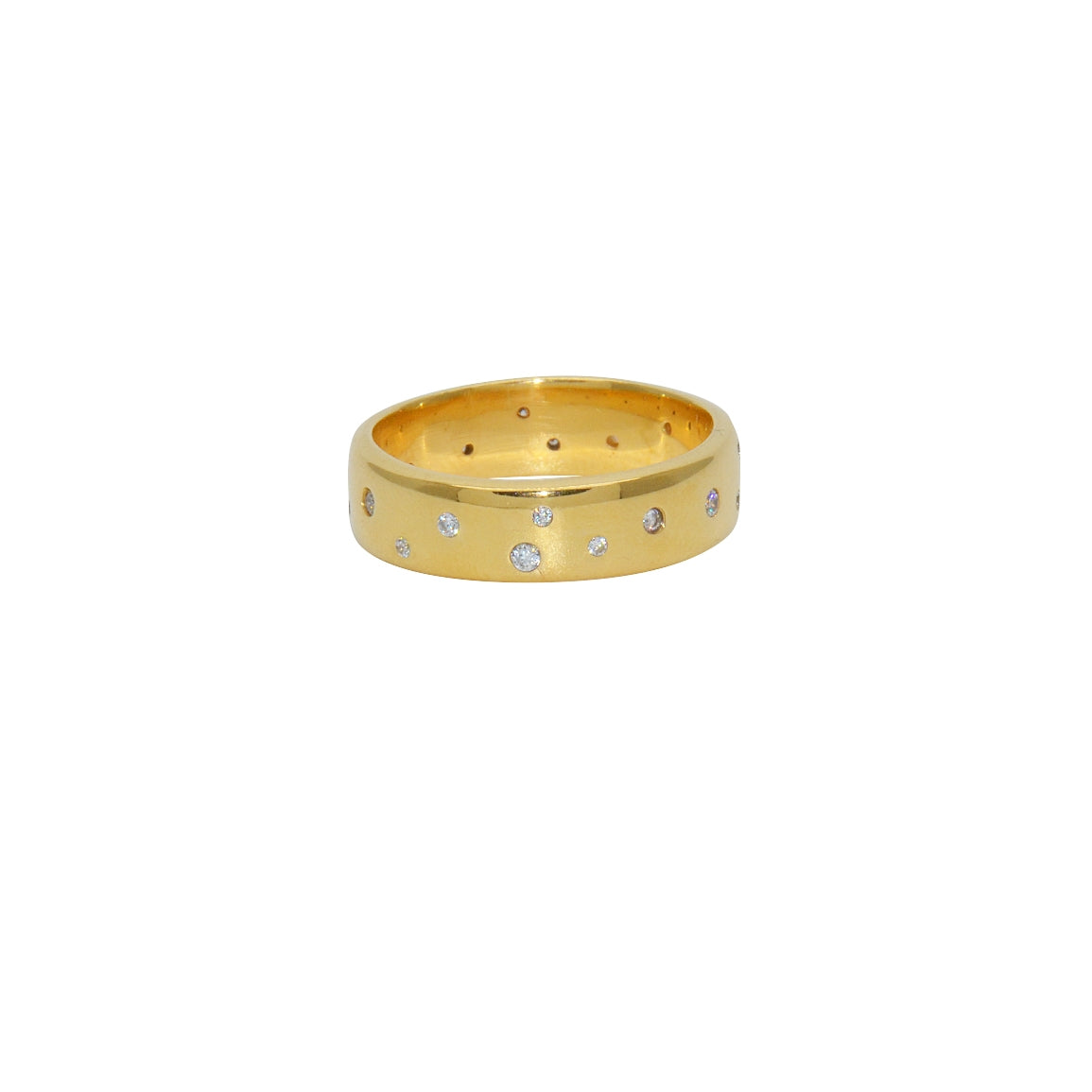 Bague dorée et zircons