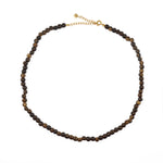 Collier perles bois moucheté