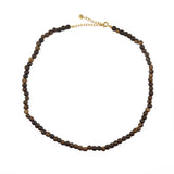 Collier perles bois moucheté