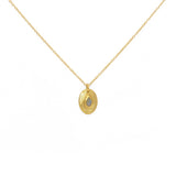 Collier doré pendentif brossé et pierre goutte