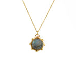 Collier dorée sphere deux pierres