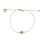 Bracelet tressé fleur dorée et zircons - BEIGE