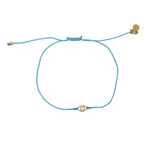 Bracelet tressé bleu jean oeil doré et zircon - TURQUOISE