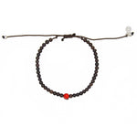 Bracelet perles bois et perle rouge