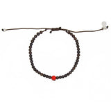 Bracelet perles bois et perle rouge