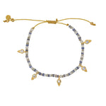 Bracelet cordon avec pierres et pampilles en pierre -