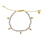 Bracelet cordon avec pierres et pampilles en pierre -