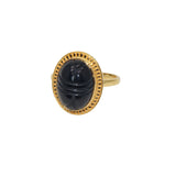 Bague dorée scarabée taillé dans la pierre et contour doré -