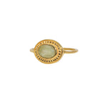 Bague dorée pierre ovale contour texturé