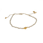Bracelet cordon et petit coeur doré brossé - BEIGE