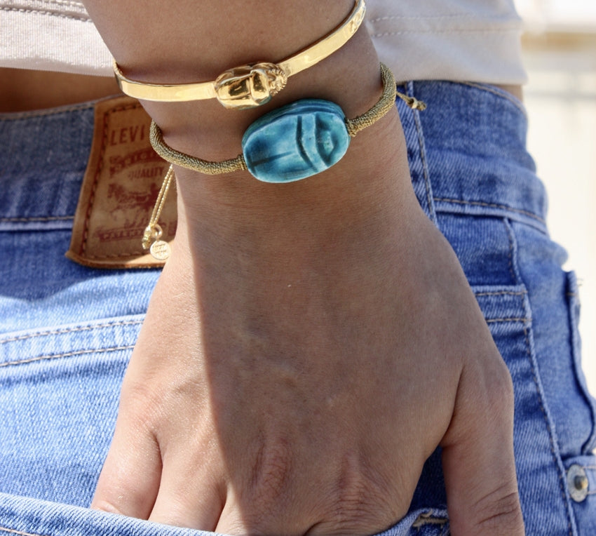 Bracelet tressé doré et scarabée