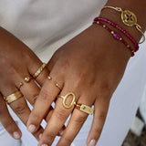 Bracelet doré et perles