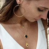 Boucles dorées double anneau et pierre cabochon
