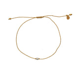 Bracelet tressé doré et perle