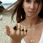 Bague dorée pierre