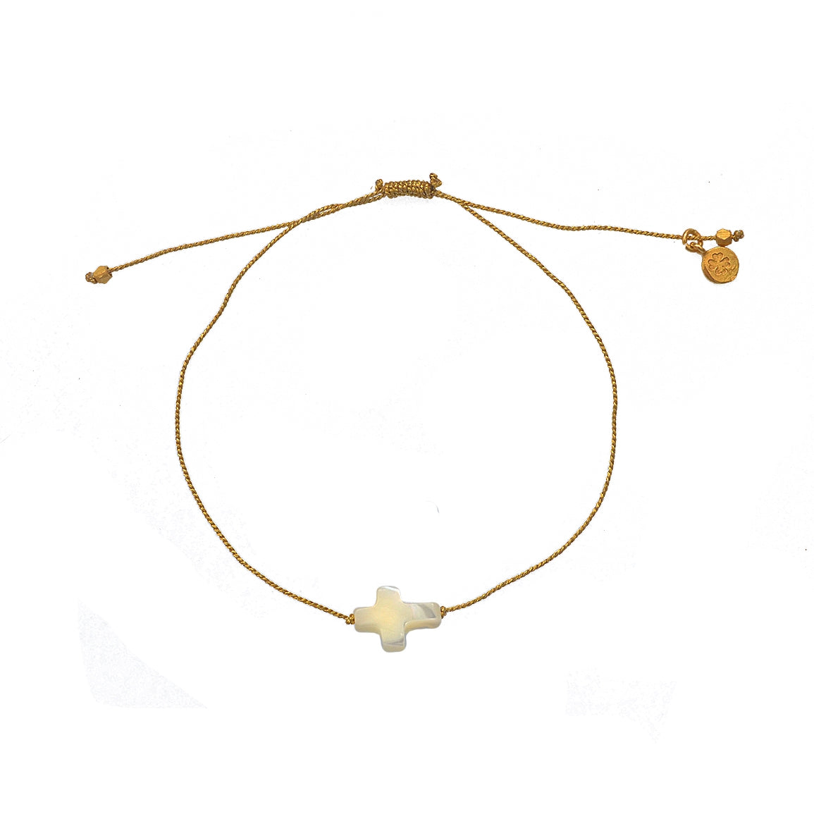 Bracelet doré et croix nacre