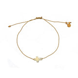 Bracelet doré et croix nacre