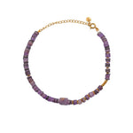 Bracelet de cheville doré et coquillage
