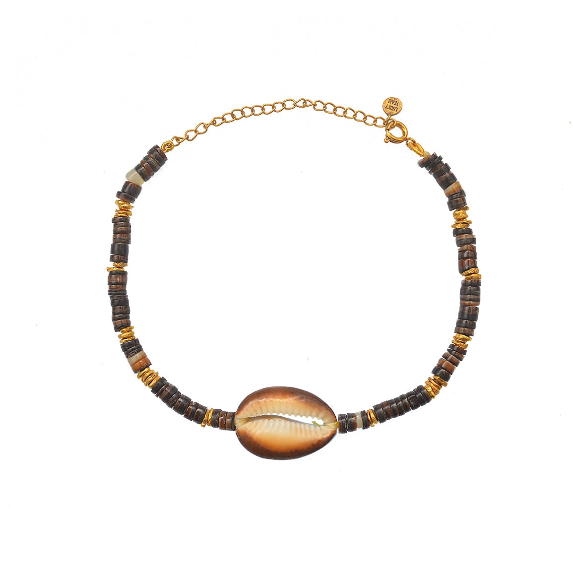 Bracelet de cheville doré et coquillages