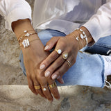 Bracelet tressé doré et perle