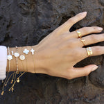 Bracelet tressé beige doré et fleur en nacre