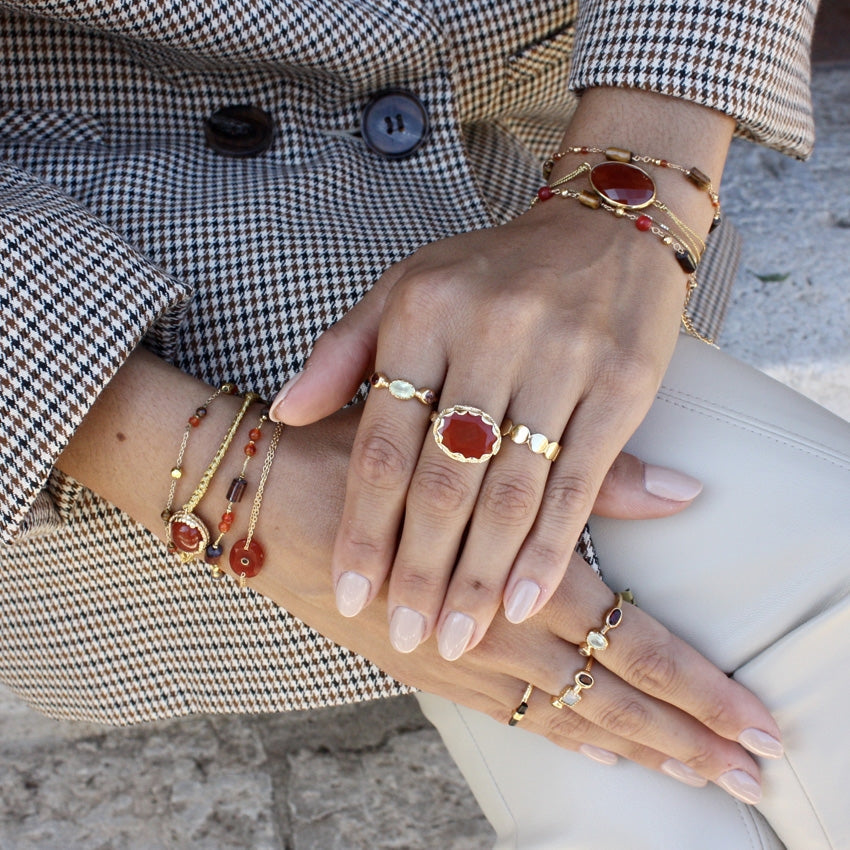 Bague dorée XXL et piere ovale