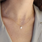 0.04K Gold and Baguette Diamond Necklace