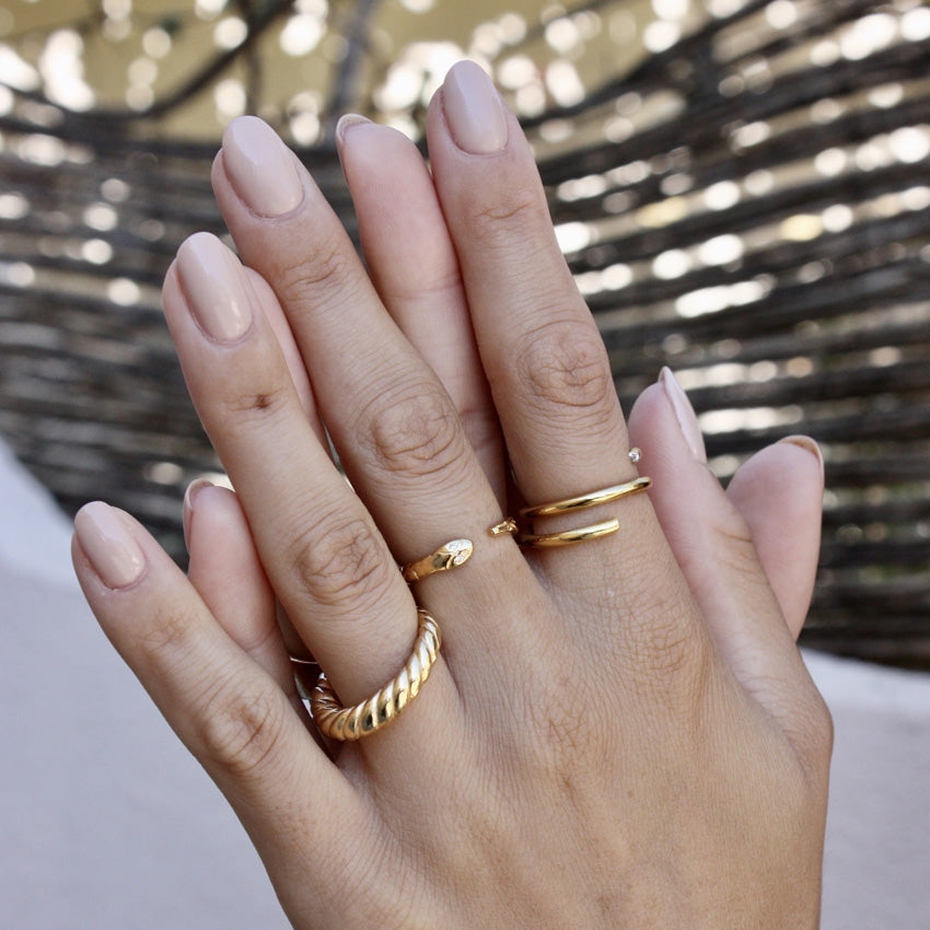 Bague dorée torsadée