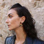 Boucles dorées soleil pierre