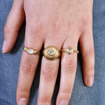 Bague dorée motifs fleurs et pierres