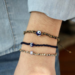 Bracelet cordon bleu marine doré et oeil