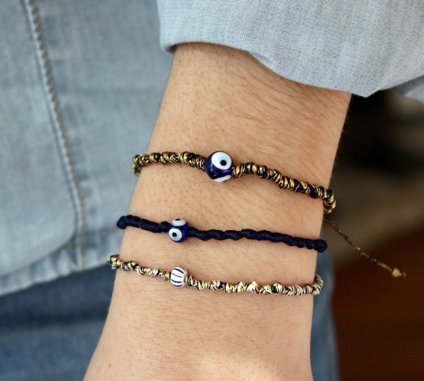 Bracelet cordon bleu marine doré et oeil