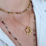 Collier doré pendentif etoile