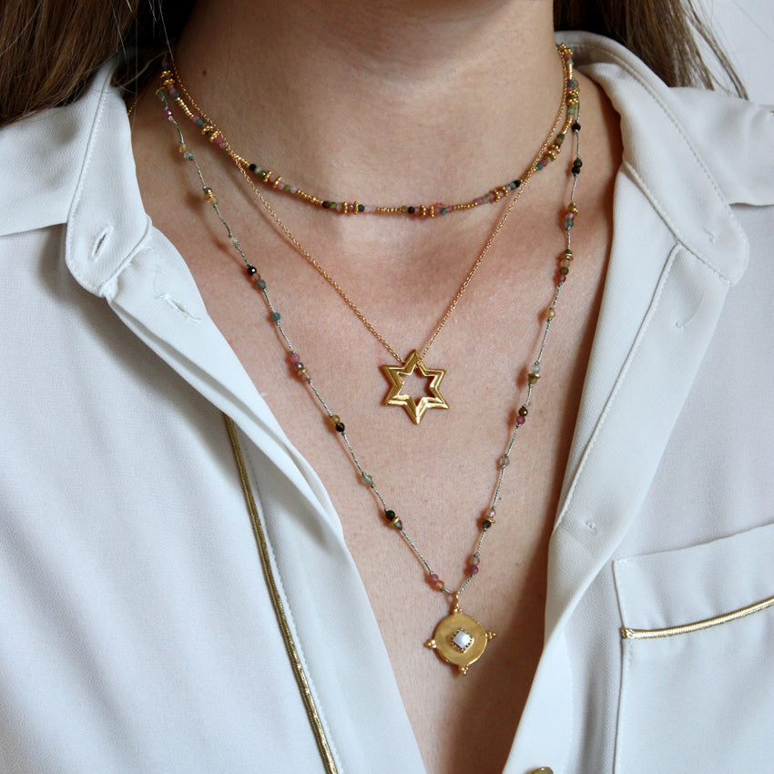 Collier doré pendentif etoile
