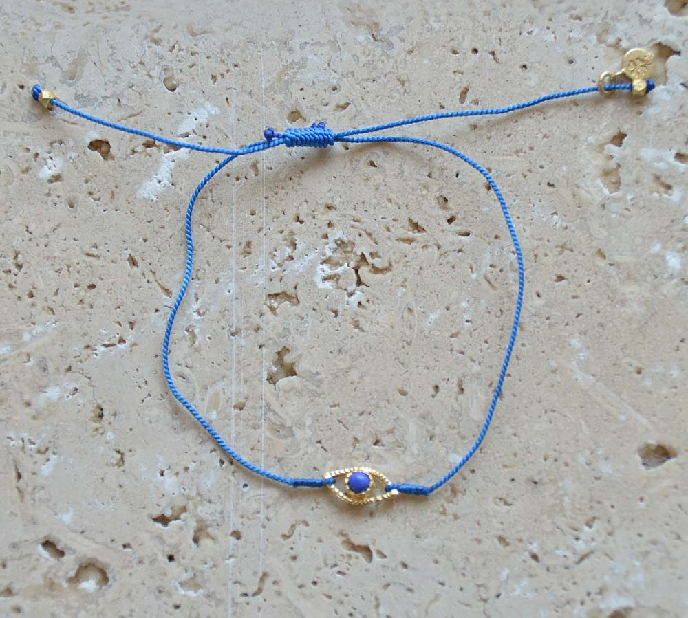 Bracelet cordon et oeil pierre