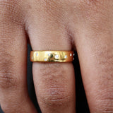 Bague dorée et zircons