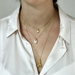 Collier doré bouddha et pierre