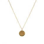 Collier doré pendentif oeil gravé