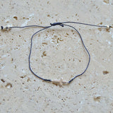 Bracelet tressé et croix argent 925
