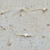 Bracelet tressé et croix argent 925