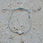 Bracelet tressé fleur argent 925 et zircons