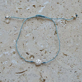 Bracelet tressé fleur argent 925 et zircons
