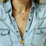 Collier doré pierres et disques dorés