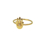 Bague dorée main de fatma et zircon